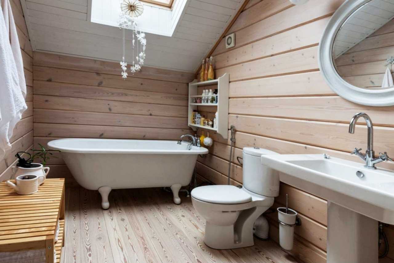 Ванная комната в деревянном доме: особенности строительства и отделки